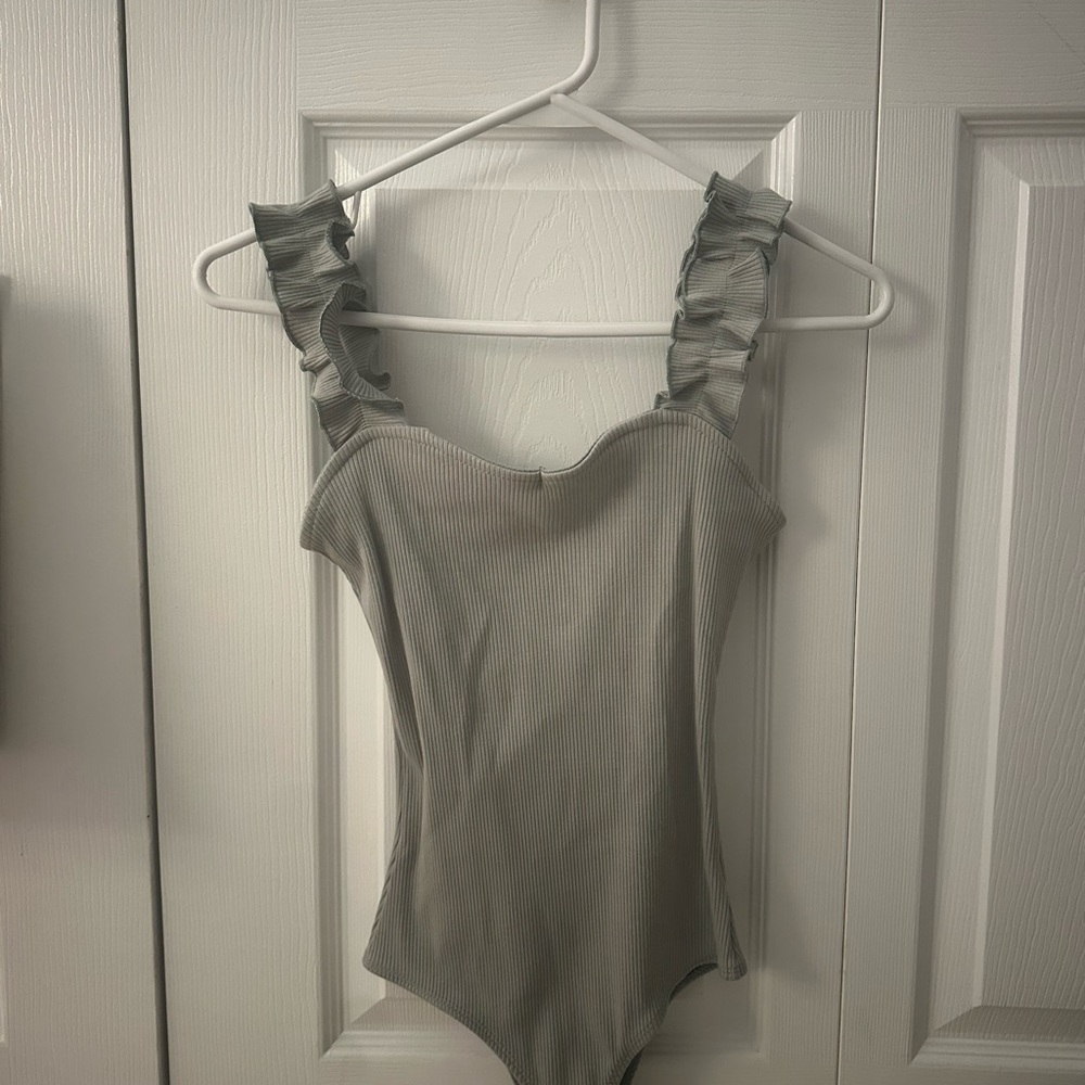 Francesca's Collections Kids Ruffled Bodysuit in Gray